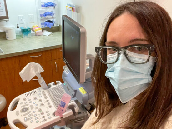 a woman at in an exam room for IVF patients